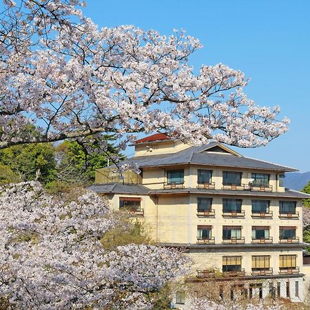 Jukeiso Hotel Hatsukaichi Bagian luar foto