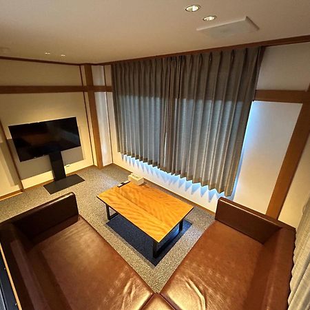Jukeiso Hotel Hatsukaichi Bagian luar foto