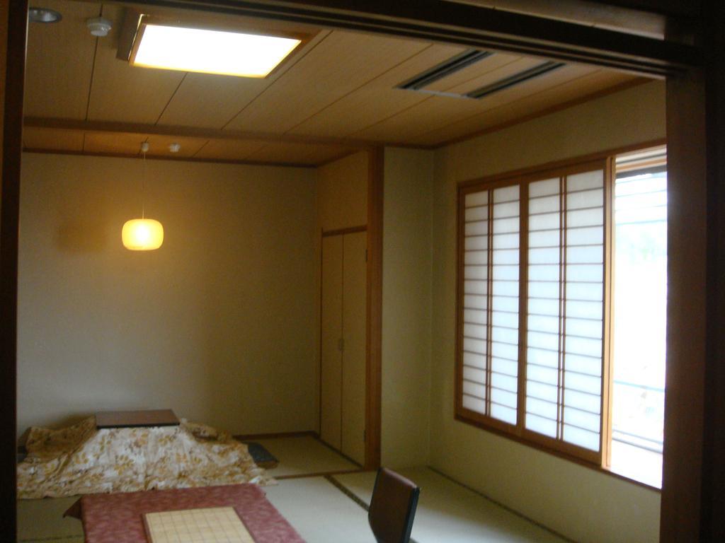 Jukeiso Hotel Hatsukaichi Bagian luar foto
