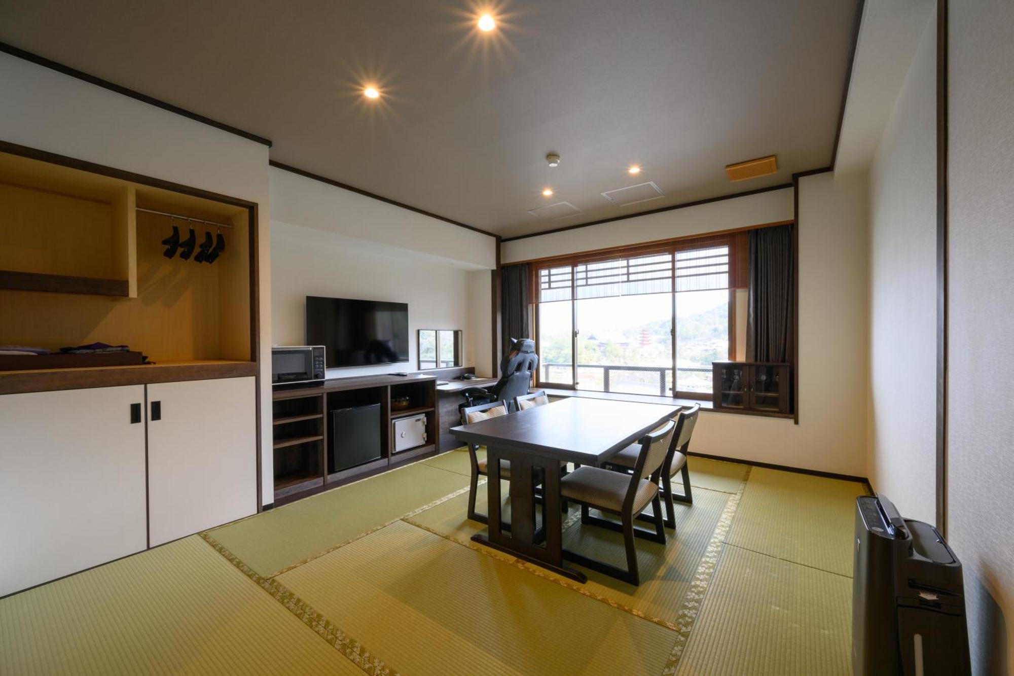 Jukeiso Hotel Hatsukaichi Bagian luar foto