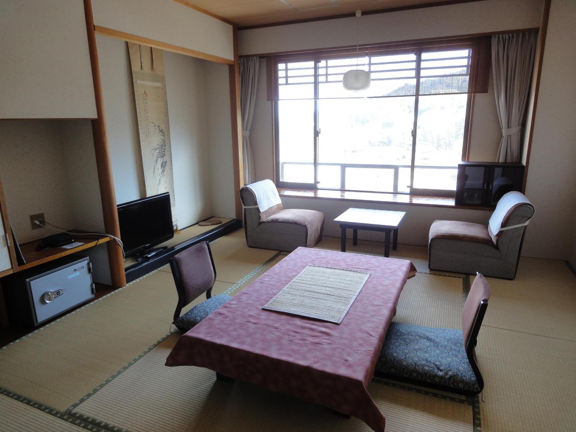 Jukeiso Hotel Hatsukaichi Bagian luar foto