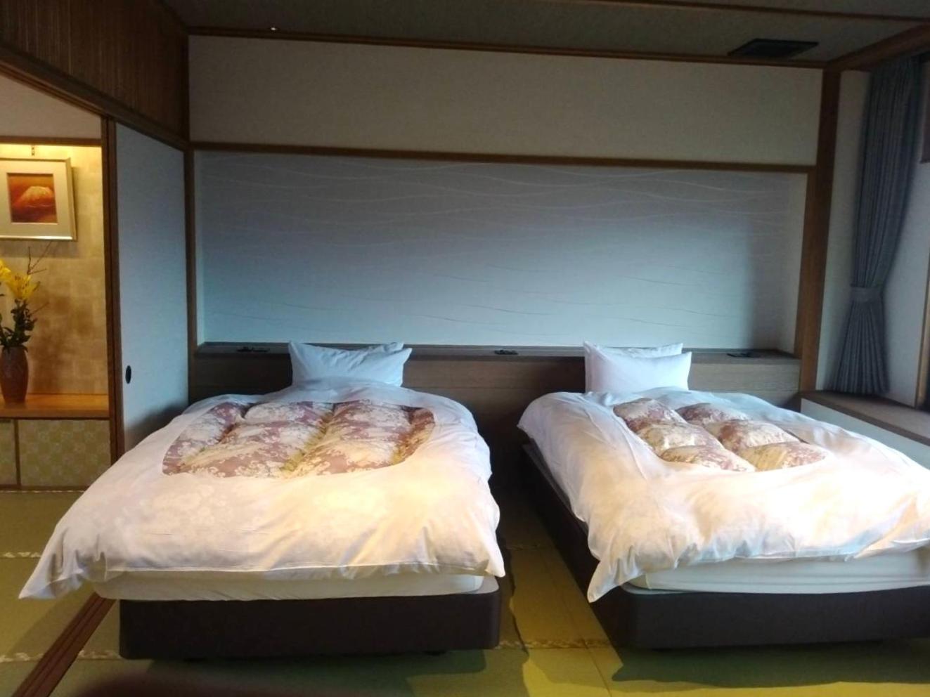 Jukeiso Hotel Hatsukaichi Bagian luar foto