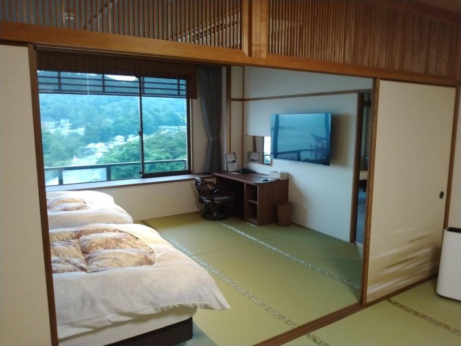 Jukeiso Hotel Hatsukaichi Bagian luar foto