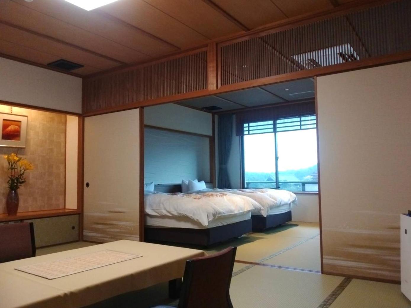 Jukeiso Hotel Hatsukaichi Bagian luar foto