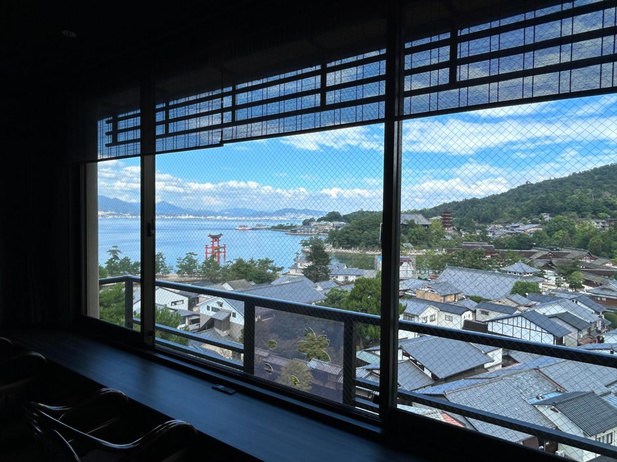 Jukeiso Hotel Hatsukaichi Bagian luar foto