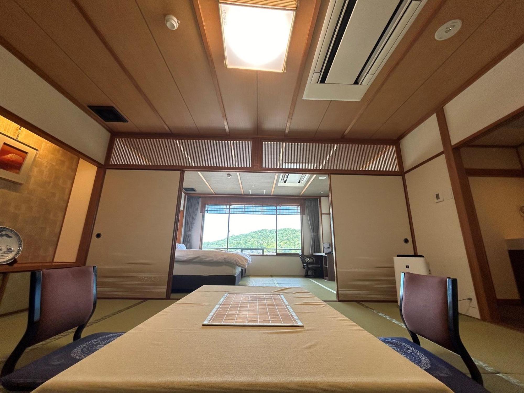 Jukeiso Hotel Hatsukaichi Bagian luar foto