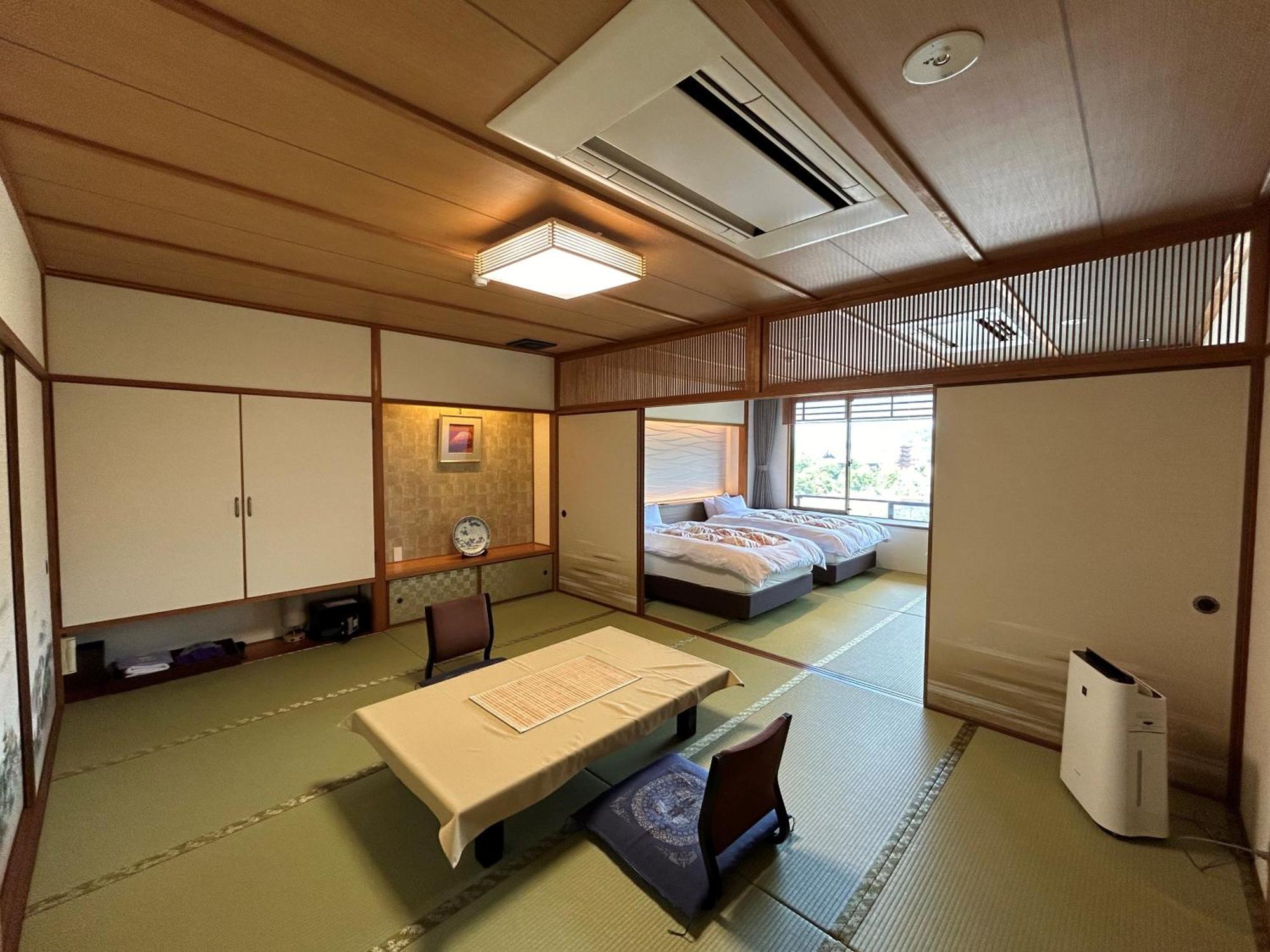 Jukeiso Hotel Hatsukaichi Bagian luar foto