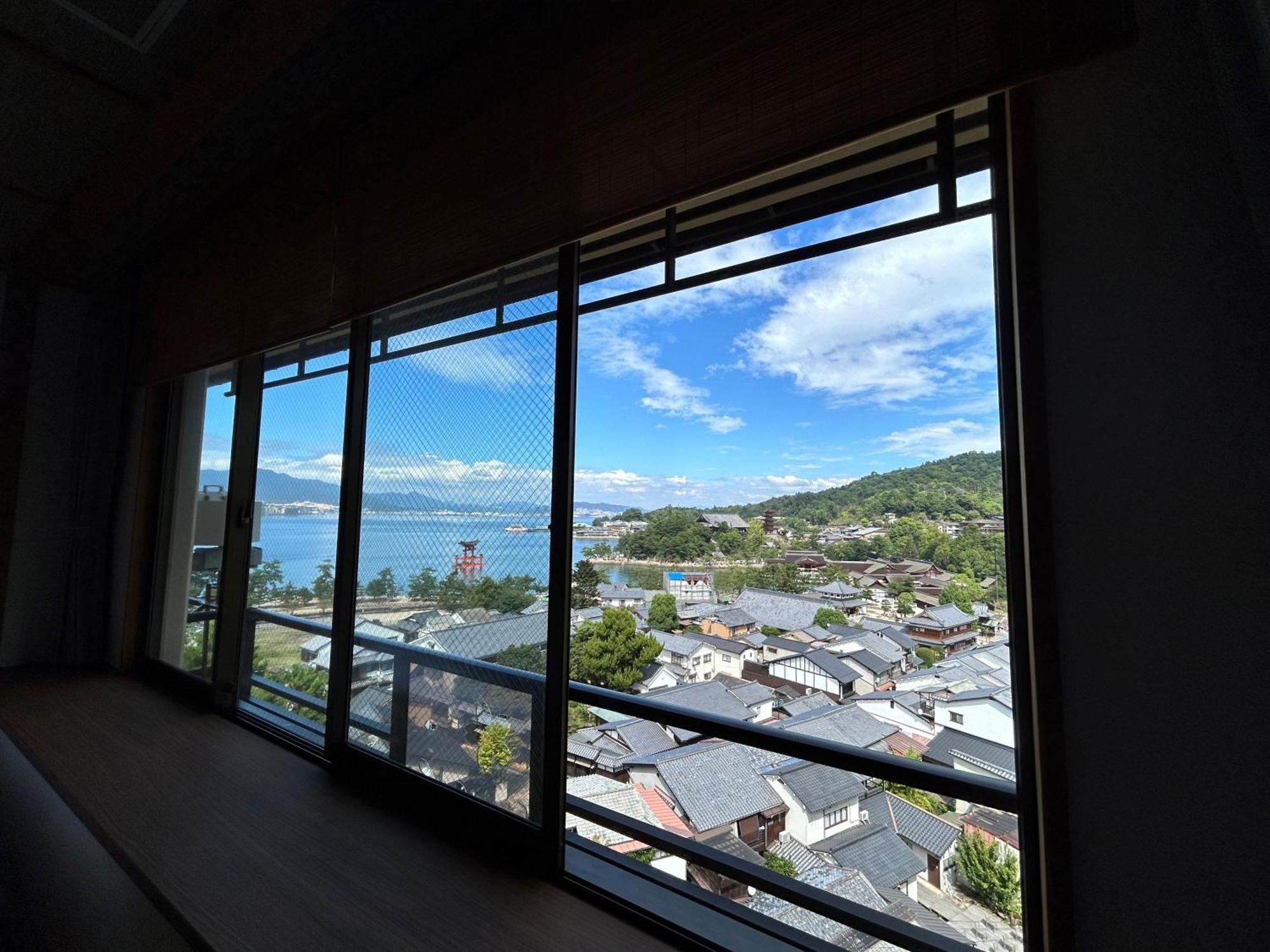 Jukeiso Hotel Hatsukaichi Bagian luar foto