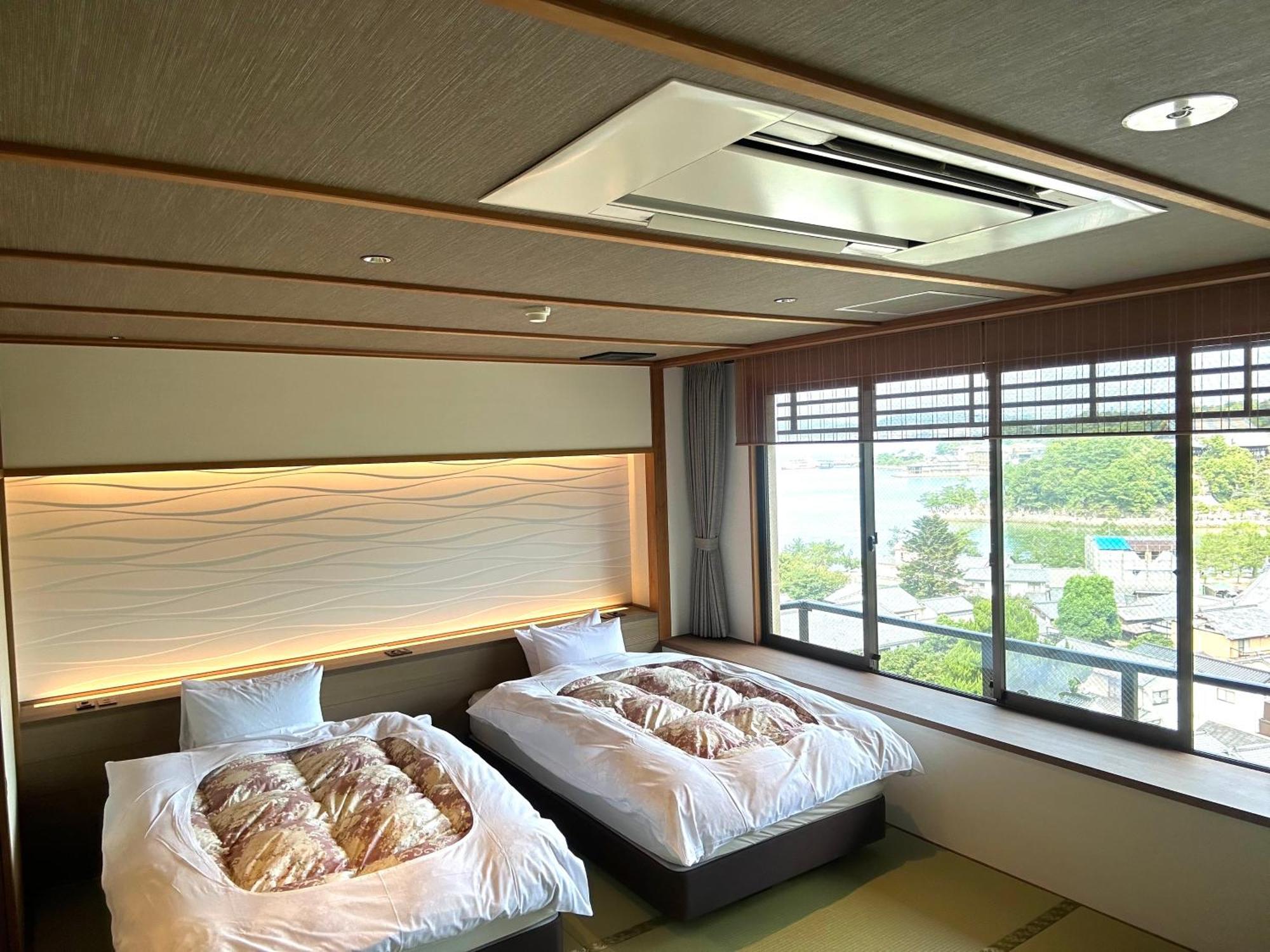 Jukeiso Hotel Hatsukaichi Bagian luar foto