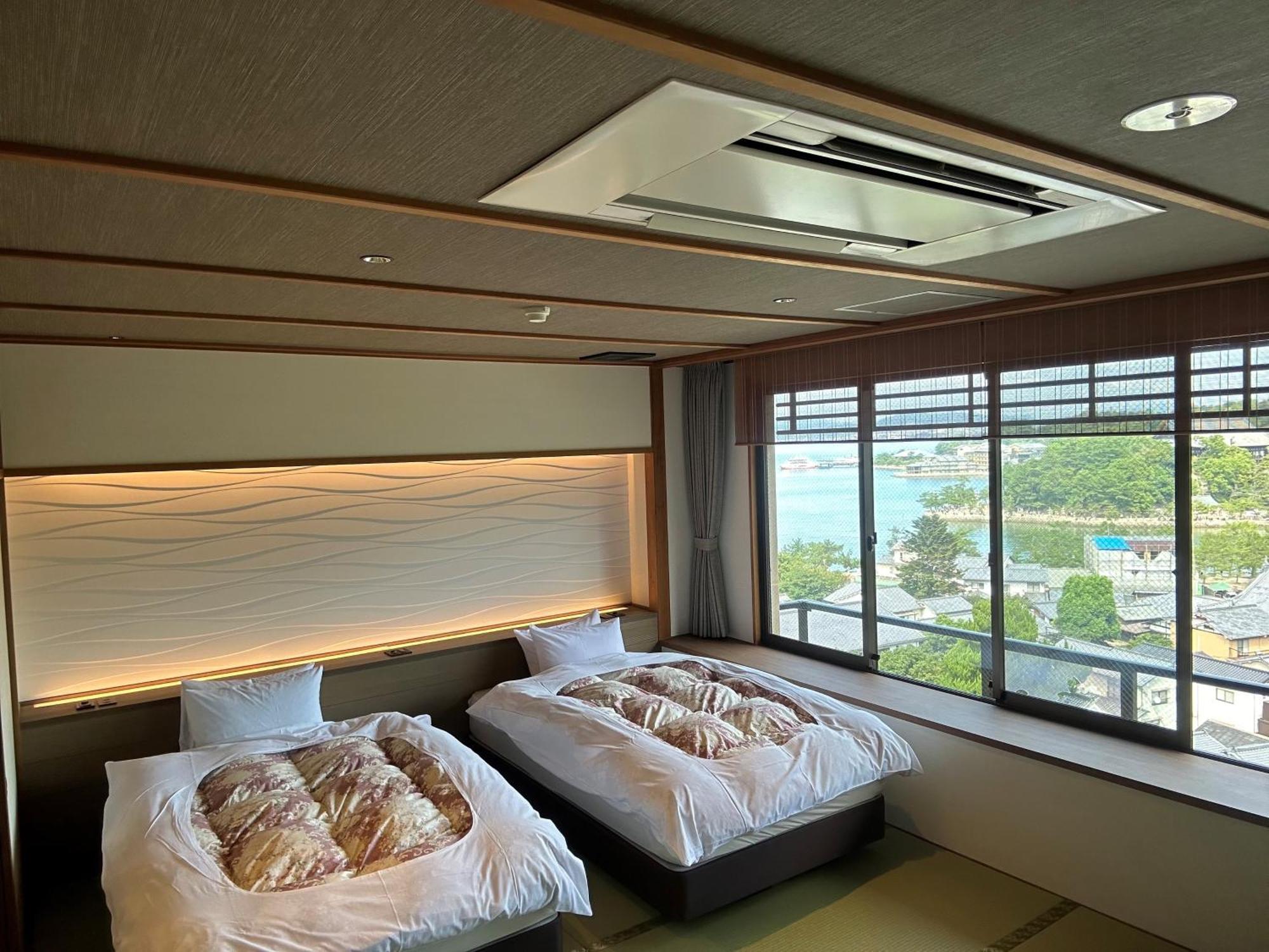 Jukeiso Hotel Hatsukaichi Bagian luar foto