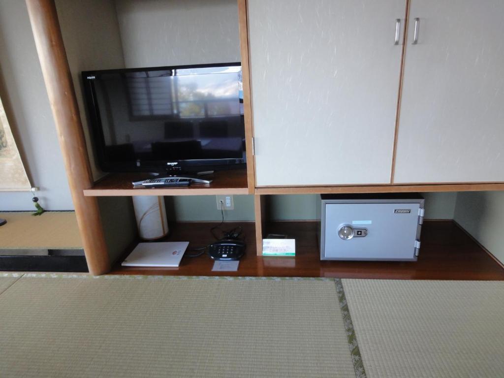 Jukeiso Hotel Hatsukaichi Bagian luar foto