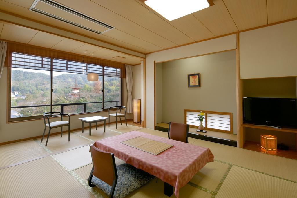 Jukeiso Hotel Hatsukaichi Bagian luar foto