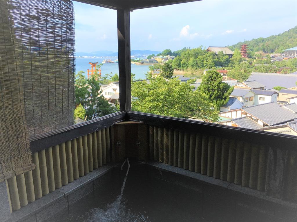 Jukeiso Hotel Hatsukaichi Bagian luar foto