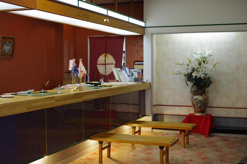Jukeiso Hotel Hatsukaichi Bagian luar foto