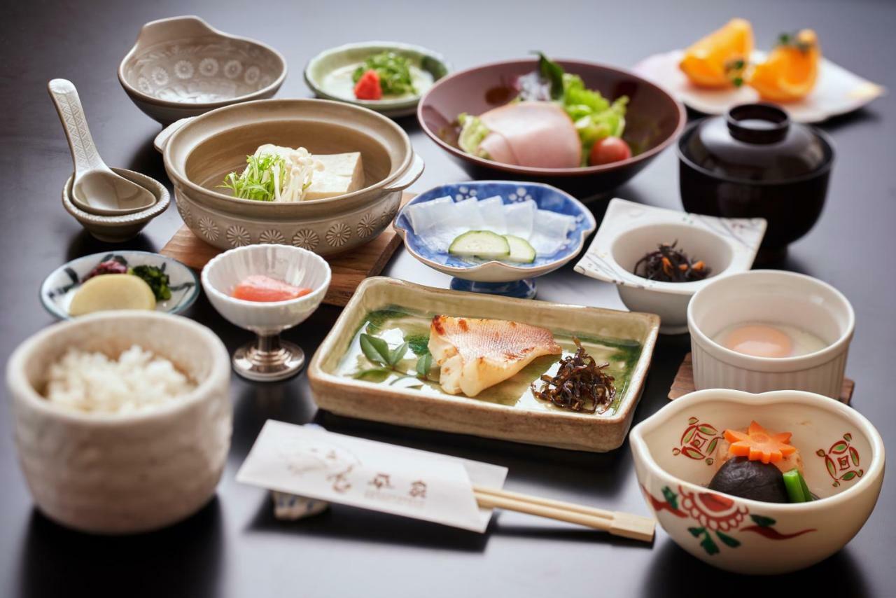 Jukeiso Hotel Hatsukaichi Bagian luar foto